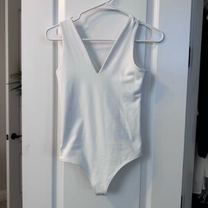 Abercrombie & Fitch White Bodysuit with Deep V-Neckline and High-Cut Leg
